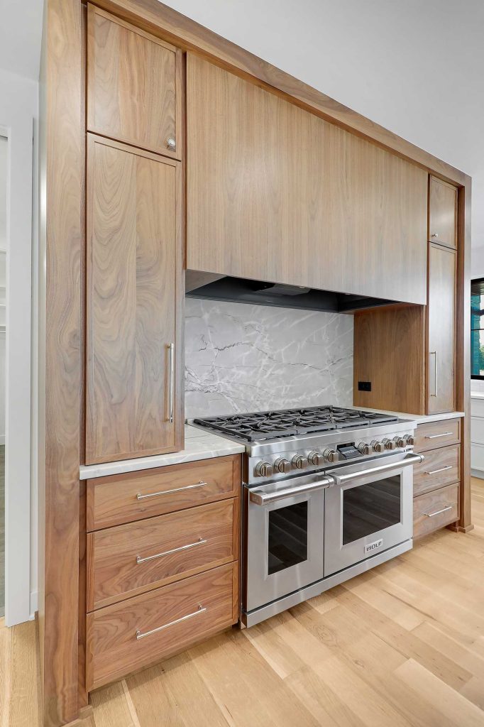 Big built in wall cabinet and shelf surrounding a double oven. 3761 William Way Independence Mn 55359 31